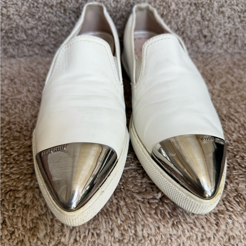 Miu Miu Cream Slip-On Flats with Silver Tips
